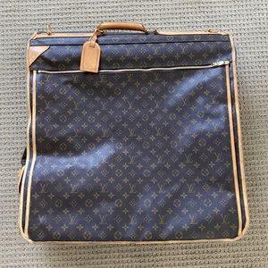 Authentic Louis Vuitton coated canvas
garment bag.